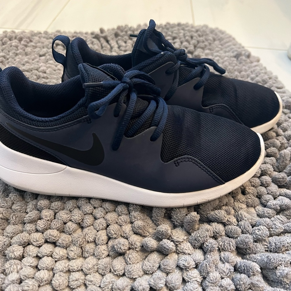 Navy Blue Nike for 5 Youth US or 37.5 EU.